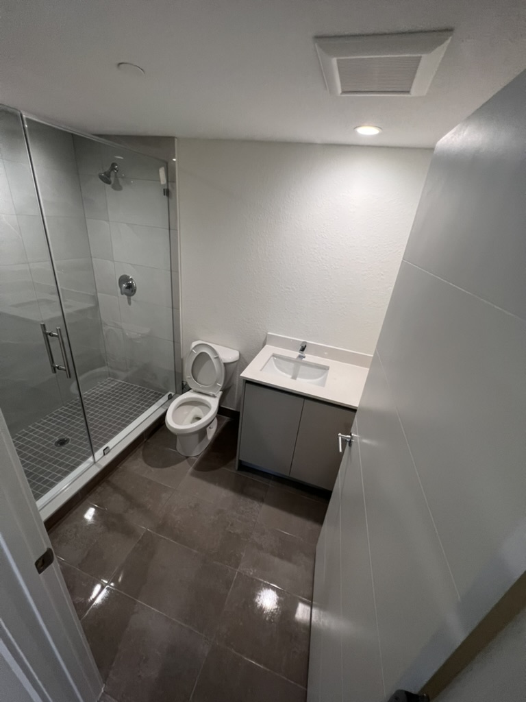 Clean completed apartment bathroom after post-construction service