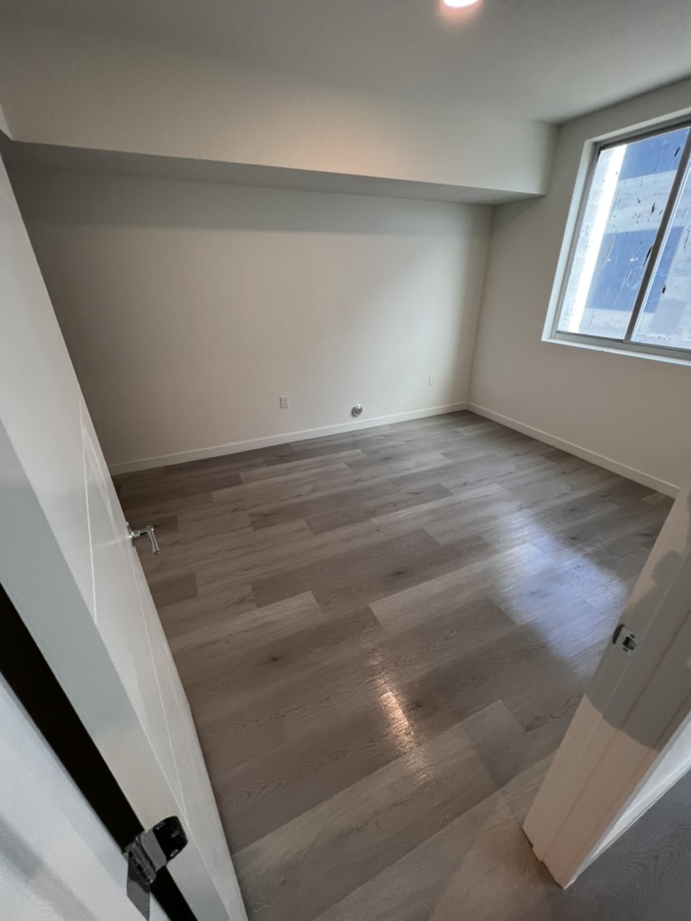 Clean apartment bedroom after post-construction cleaning