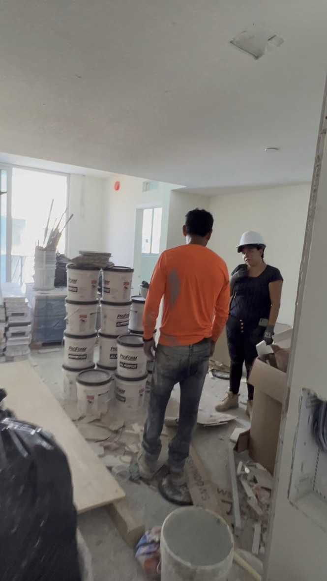Apartment with construction materials and residue before post-construction cleaning